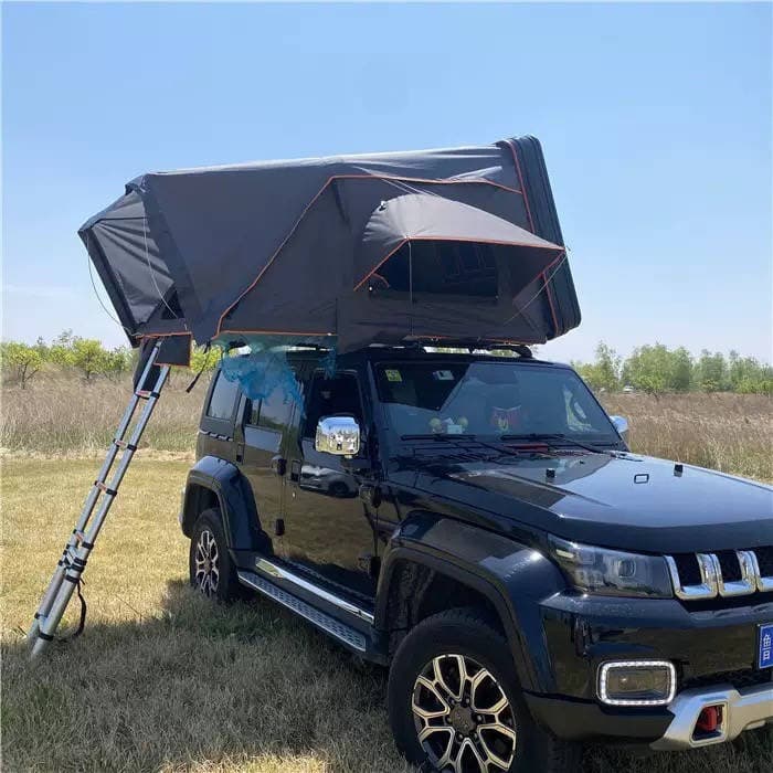 Vehicle rooftop tent installed for outdoor use